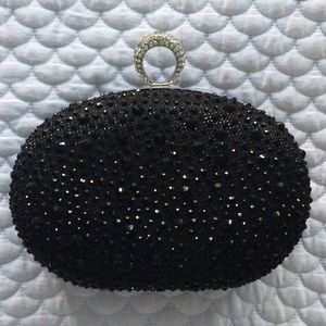 Elegant evening clutch with crossbody chain